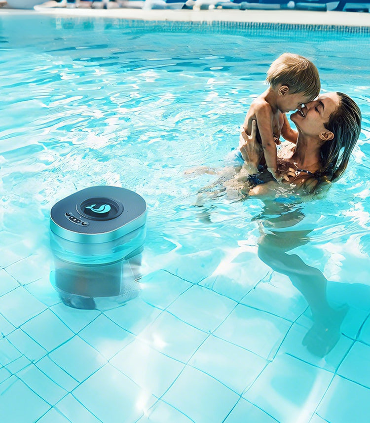 FinWhale Smart Chlorine Dispenser floating in a clear swimming pool